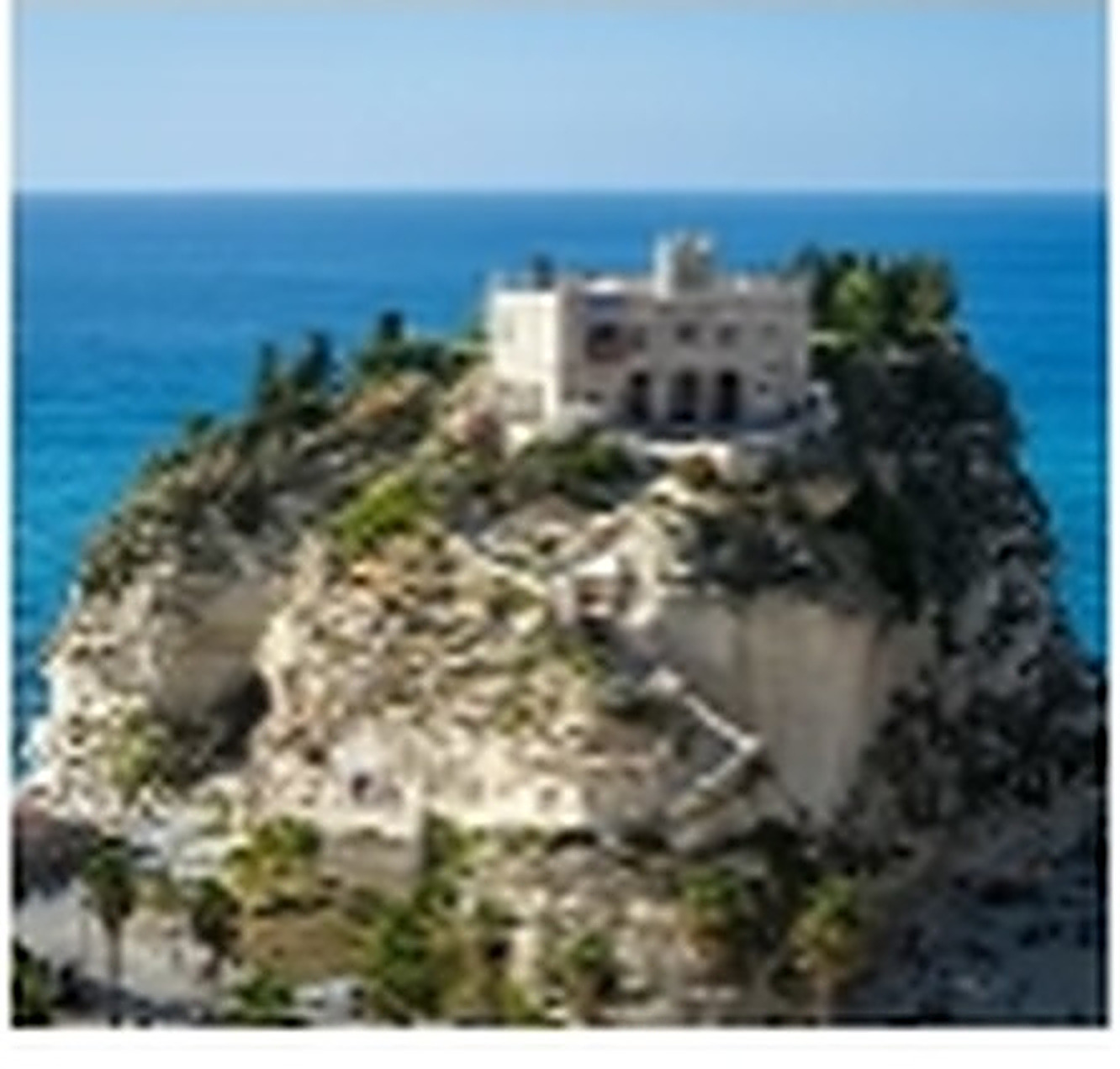 Clifftop castle above the sea in Scilla